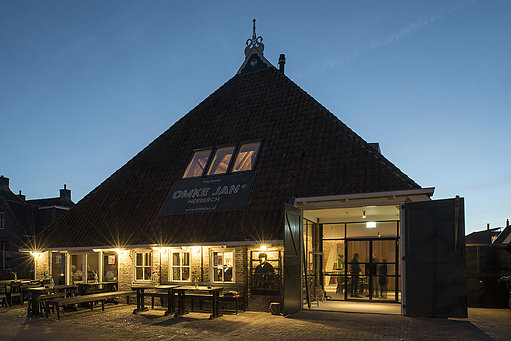 NLD, The Netherlands, Woudsend, traditional farm Jentsje is under monument protection and has been refurbished by Eek en Dekkers (Piet Hein Eek Architecure) and is now Omke Jan - restaurant and hotel